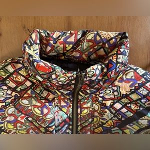 Desigual printed puffer, size Large (EU 44), multicolored, very light and warm.